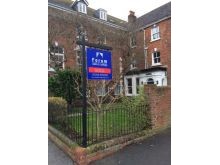 A Forum Sales and Lettings Sold board.